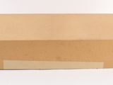 a cardboard box that is sitting on a white surface