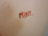 a close up of a person ' s back with a tattoo on it