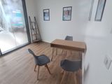 a room with a table and two chairs in it