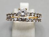 a close up of a ring with a diamond on top of it
