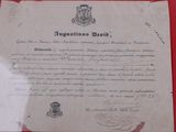 an old document is on display in a red frame