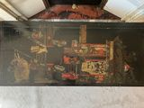 a painting on the wall of a room that has a clock on it