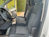 a picture of the inside of a car with the door open