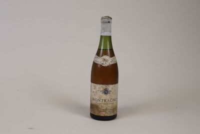 a bottle of wine that is sitting on a table