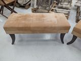 two benches that are sitting in a room