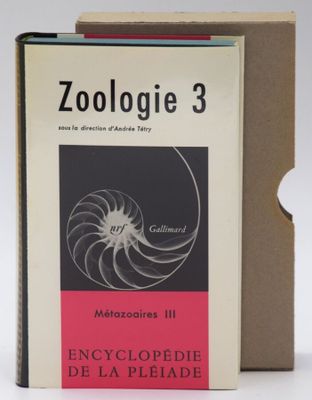an image of a book sitting on top of a table next to a box