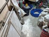 an image of a room with a lot of stuff on the floor