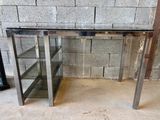 une image d'une table console en verre et métal