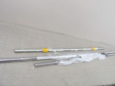 two tools that are laying on a table
