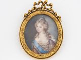 portrait of a lady in a blue dress in a gold frame