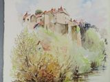 watercolor painting of a castle on a hill overlooking a river