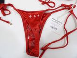a red bikini that has a tag on it