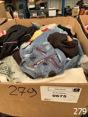 a cardboard box full of clothes in a store