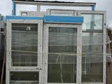 two windows that are sitting on top of a pallet