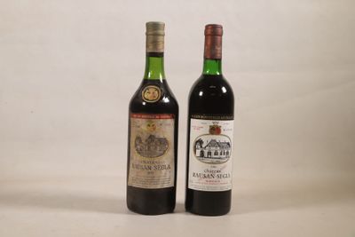 deux bouteilles de vin posées l'une à côté de l'autre sur une table