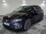 the front view of a blue fiat car on a checkered floor