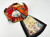 a small piece of cloth with a picture of a woman on it