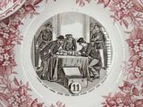three red and white plates with a picture of a group of people sitting at a table