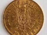 l'image d'une pièce d'or ornée d'une couronne