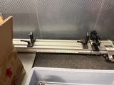 a machine that is sitting on the floor next to a box