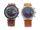 pair of two watches with brown leather straps on a white background
