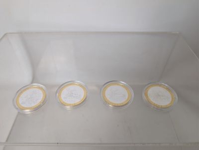 six containers of ice cream sitting in a clear box