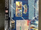 a close up of a box of pokemon trading cards on a table
