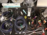 a lot of cables that are sitting on a table