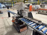 an image of a machine that is working on a conveyor belt