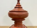 an image of a wooden object on top of a wooden table