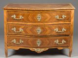 an antique chest of drawers with a wooden top and brass handles