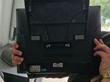 a woman that is holding a laptop in her hands