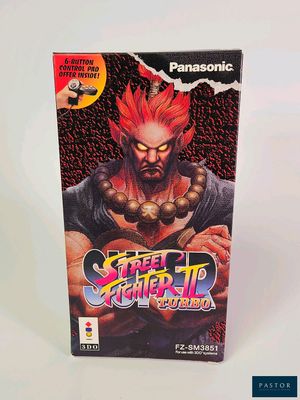 On voit ici la boîte du jeu Nintendo « Street Fighter II ».