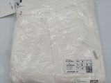 a plastic bag that has a white shirt in it