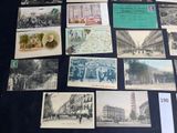 many old postcards on display on a table