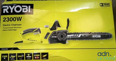 a box of ryobi electric chainsaw in the packaging