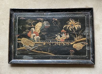 painting on the wall of a room with a bird and other items