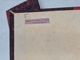 a close up of a piece of paper with a picture on it