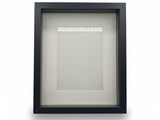 a black and white picture frame with a picture in it