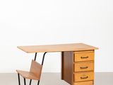 a wooden desk with two drawers and a chair in front of it