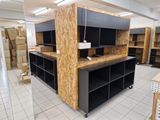 a room that has a lot of shelves and cabinets in it