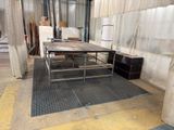 a table that is sitting in the middle of a room