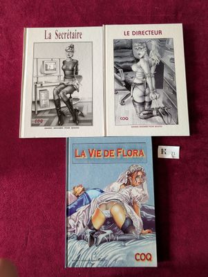 trois livres sont posés sur une nappe rouge, sur une table