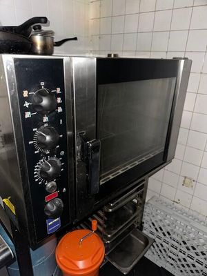 a microwave sitting on top of a counter in a kitchen
