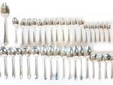 a lot of spoons and spoon spoons on the table