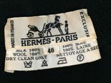 the label on the back of a black t - shirt that says hermes paris
