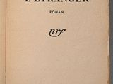 an open book with a black and white title on it