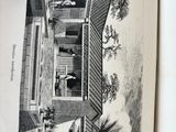 an open book with a picture of a house on it