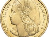 an image of a gold coin with a woman ' s face on it