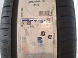 a close up of a tire with a sticker on it